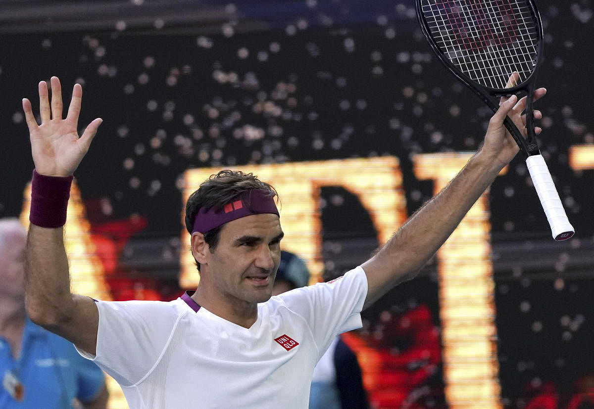 Switzerland's Roger Federer reacts after defeating Tennys Sandgren of the U.S. in their quarterfinal match at the Australian Open tennis championship in Melbourne. AP/PTI