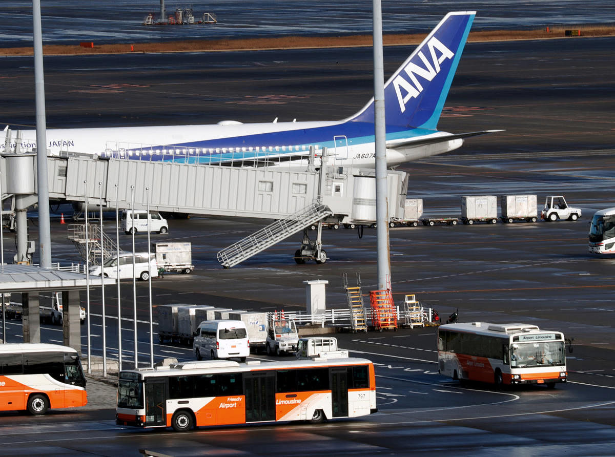 A Boeing 767-300ER plane chartered by the Japanese government, believed to be carrying evacuated Japanese nationals living in Wuhan landed at Haneda airport amid an outbreak of coronavirus in China, in Tokyo, Japan January 29, 2020. (Reuters Photo)