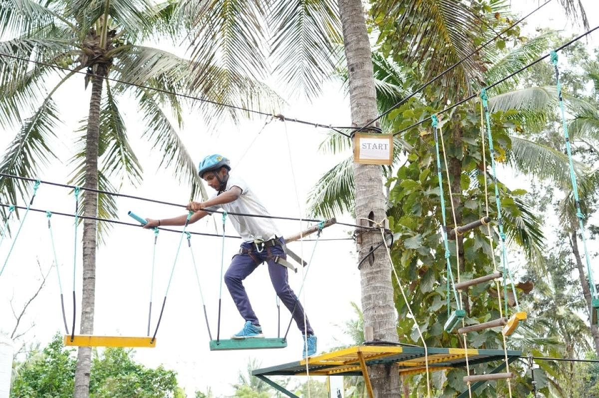 Students involved in adventure sports at Purna Chetana Public School, in Mysuru.