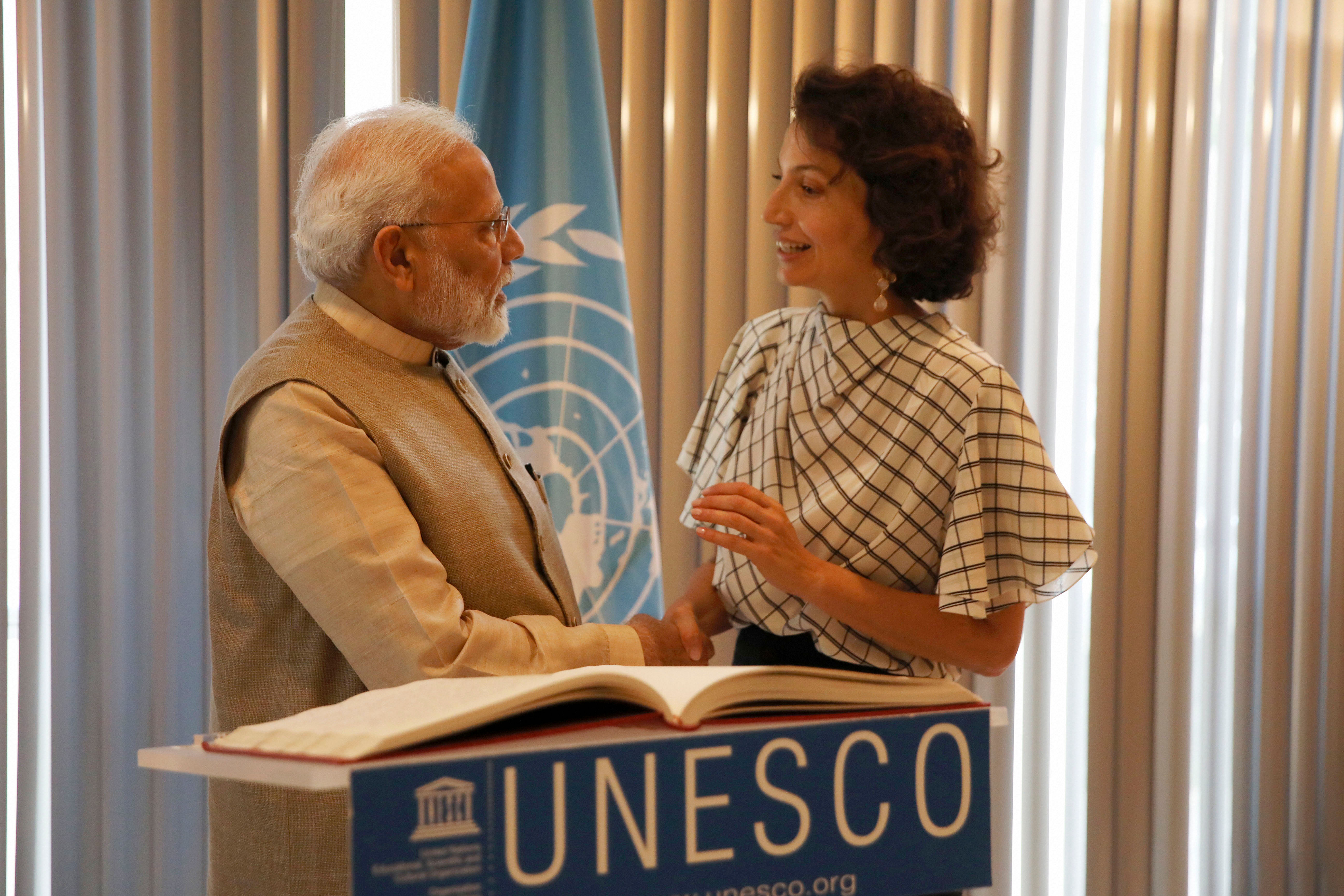 Indian Prime Minister Narendra Modi shakes hands with UNESCO'S Director-General Audrey Azoulay. (Photo Credits: PTI)