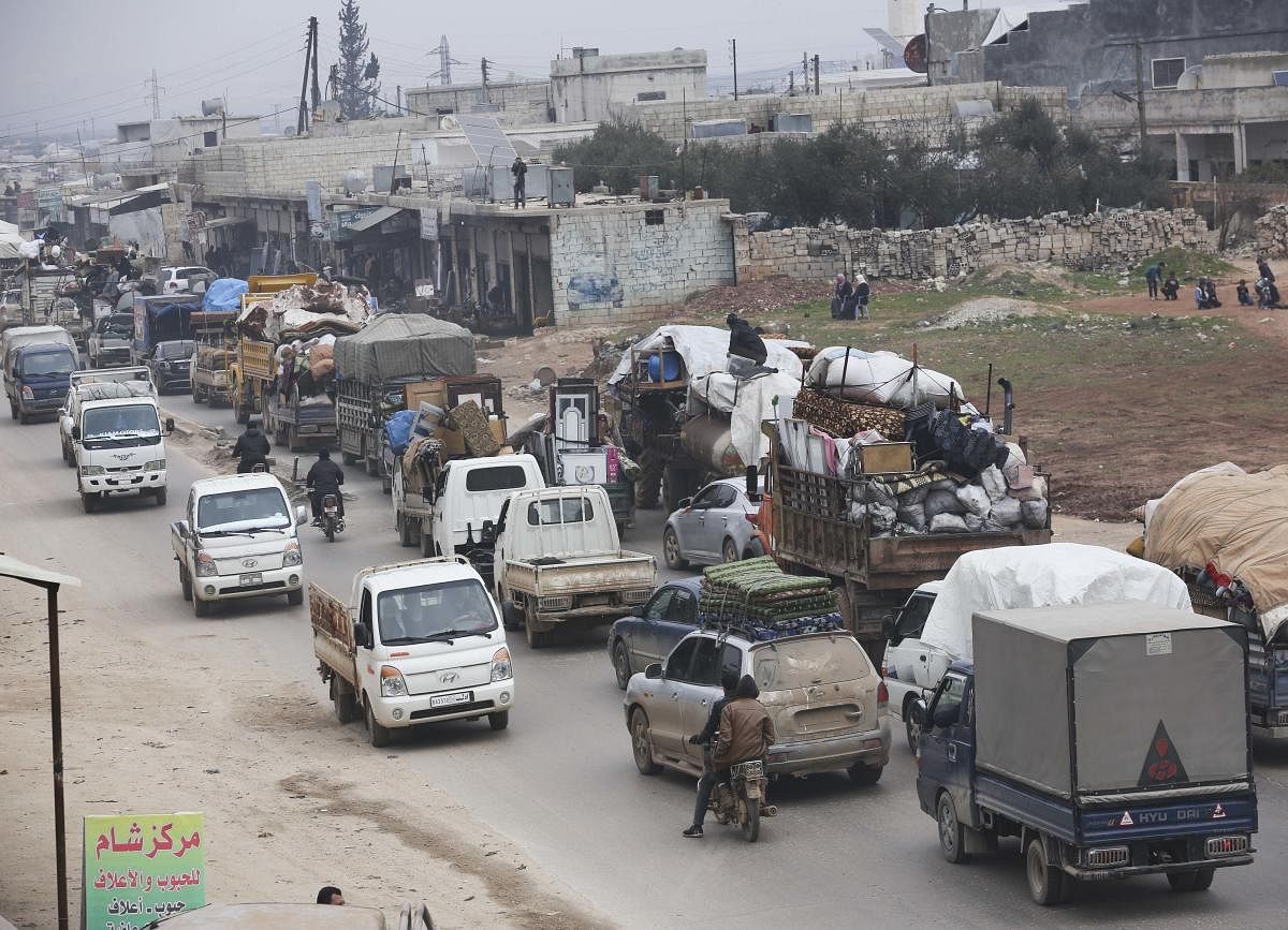 Syrian flee the advance of the government forces in the province of Idlib, Syria. (AP)