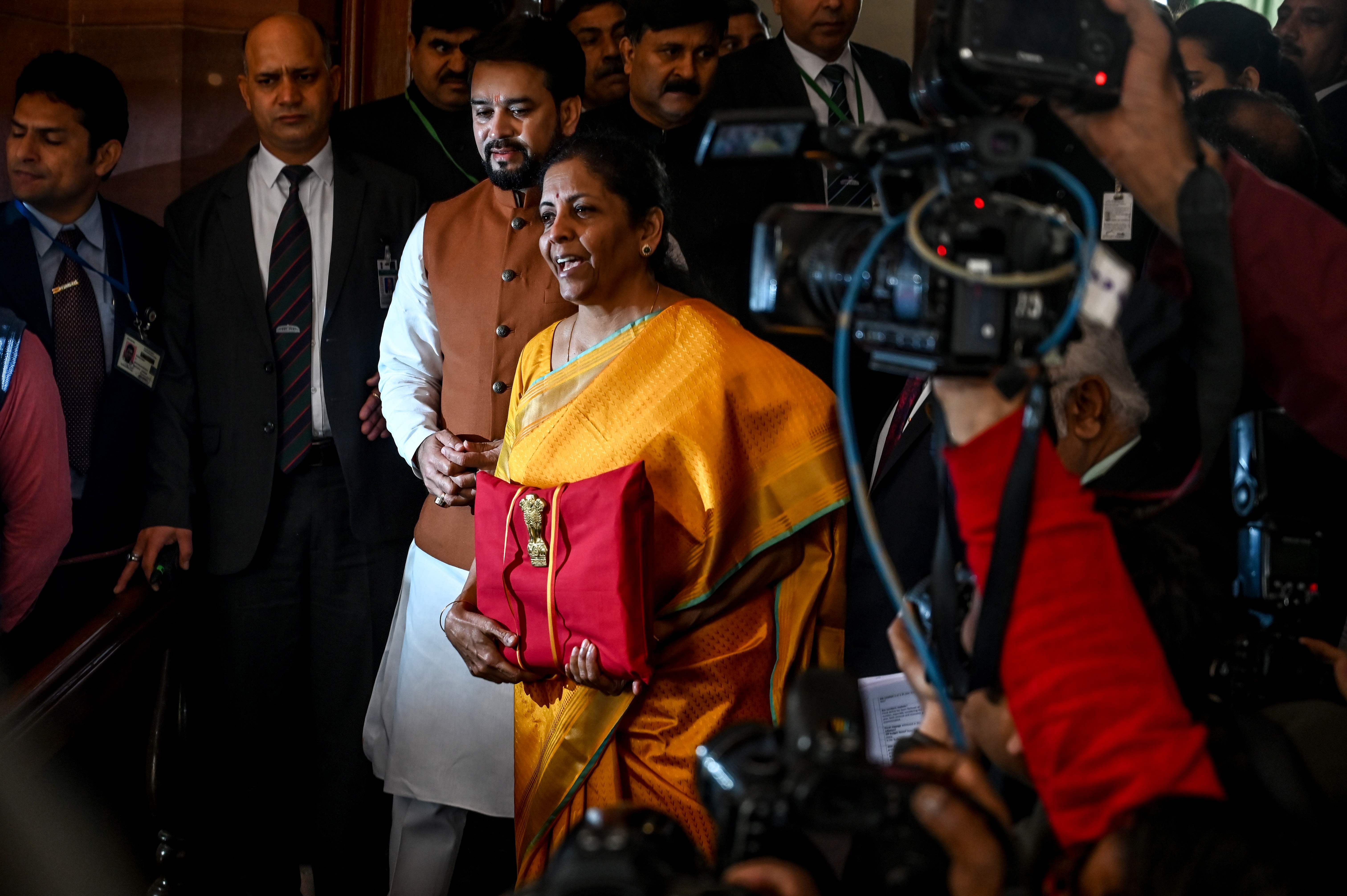 India's Finance Minister Nirmala Sitharaman (3R) looks on as she leaves the Finance Ministry for the Parliament to announce the 2020-21 union budget, in New Delhi on February 1, 2020. (AFP Photo)