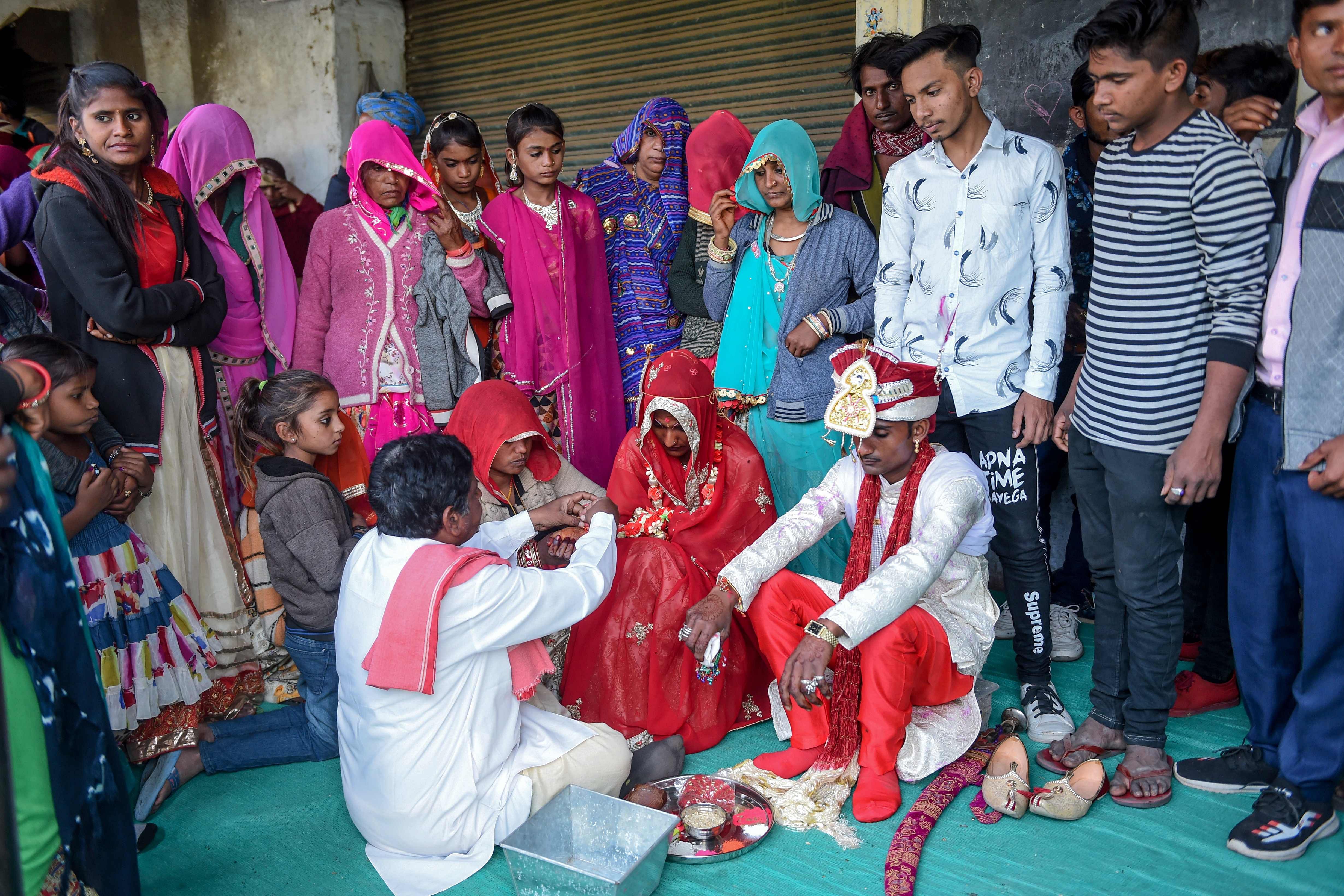 The JDP initially thought that the couples were being converted but later they understood since the mass wedding was organised as per adivasi rituals.  (Credit: AFP Photo)