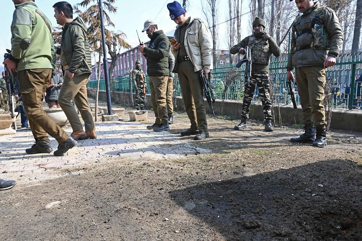 Indian government forces stand near a site following a grenade blast in Srinagar (AFP Photo)