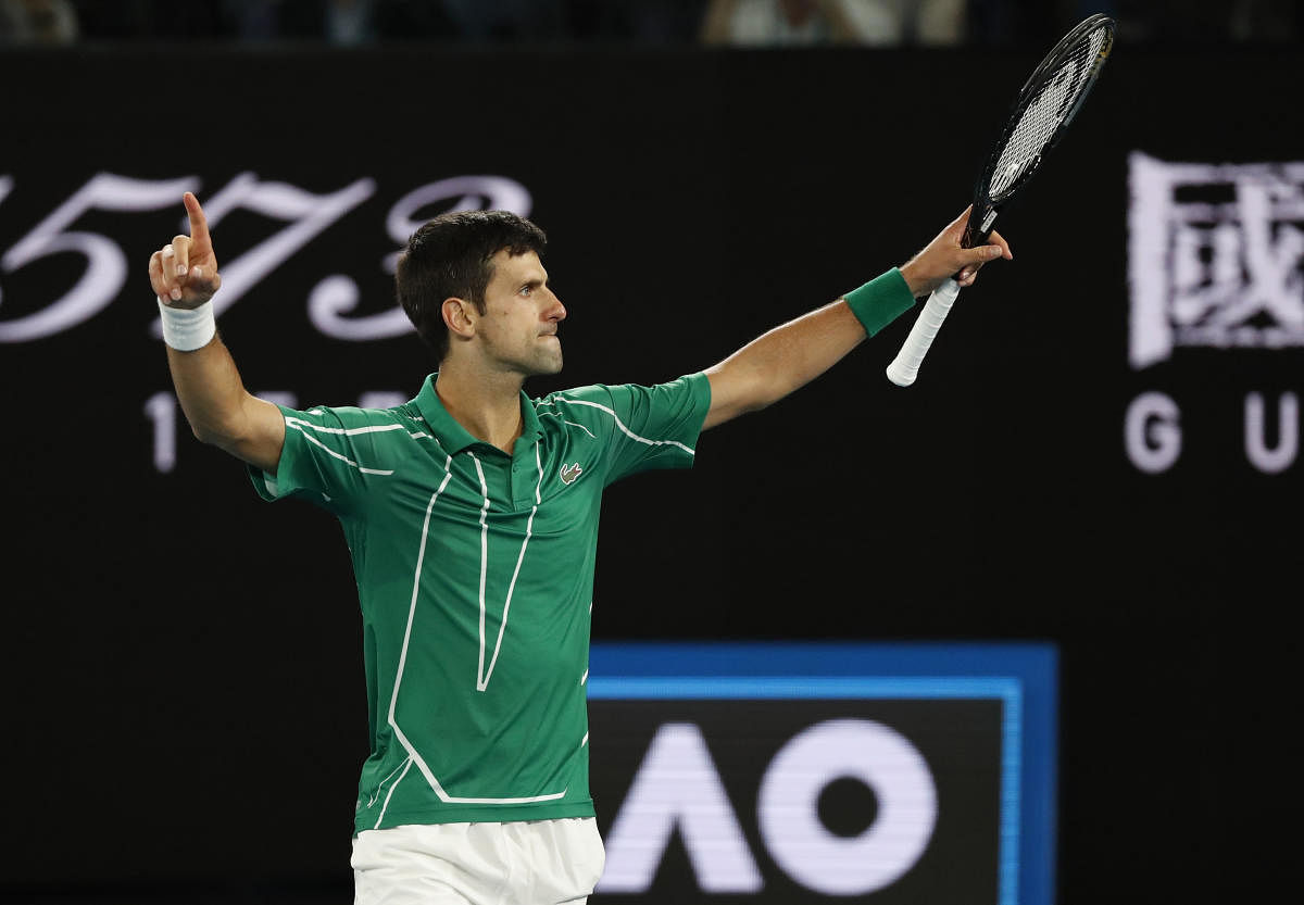 Novak Djokovic celebrates winning his match against Austria's Dominic Thiem. REUTERS