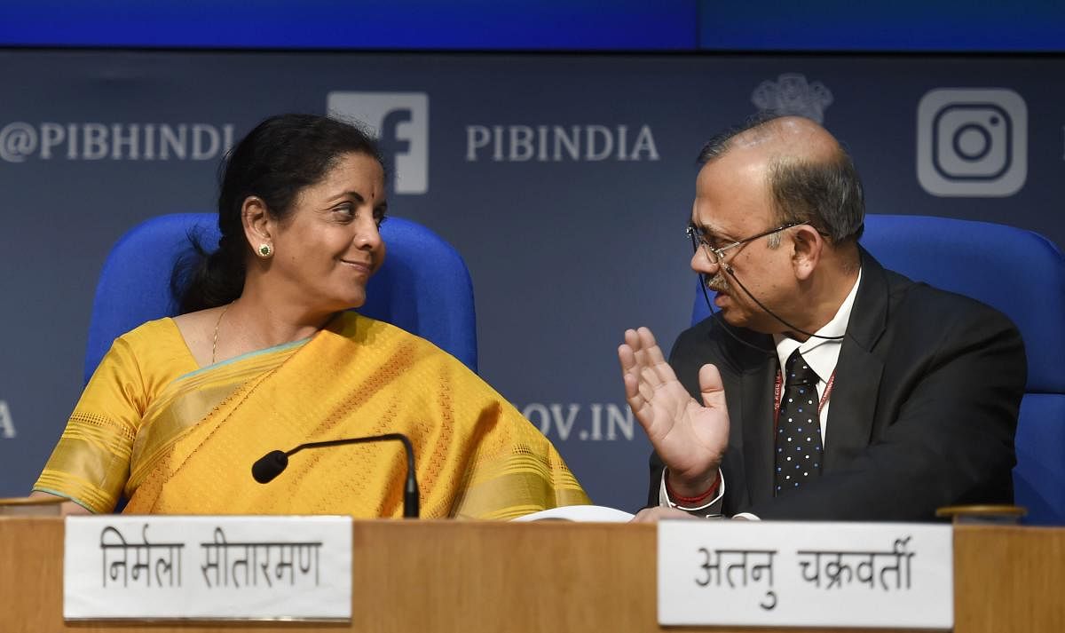Union Finance Minister Nirmala Sitharaman with Economic Affairs Secretary Atanu Chakraborty (R) during the post-budget press conference in New Delhi, Saturday, Feb. 1, 2020. Sitharaman presented the Union Budget 2020-21 in the Lok Sabha today. (PTI Photo)