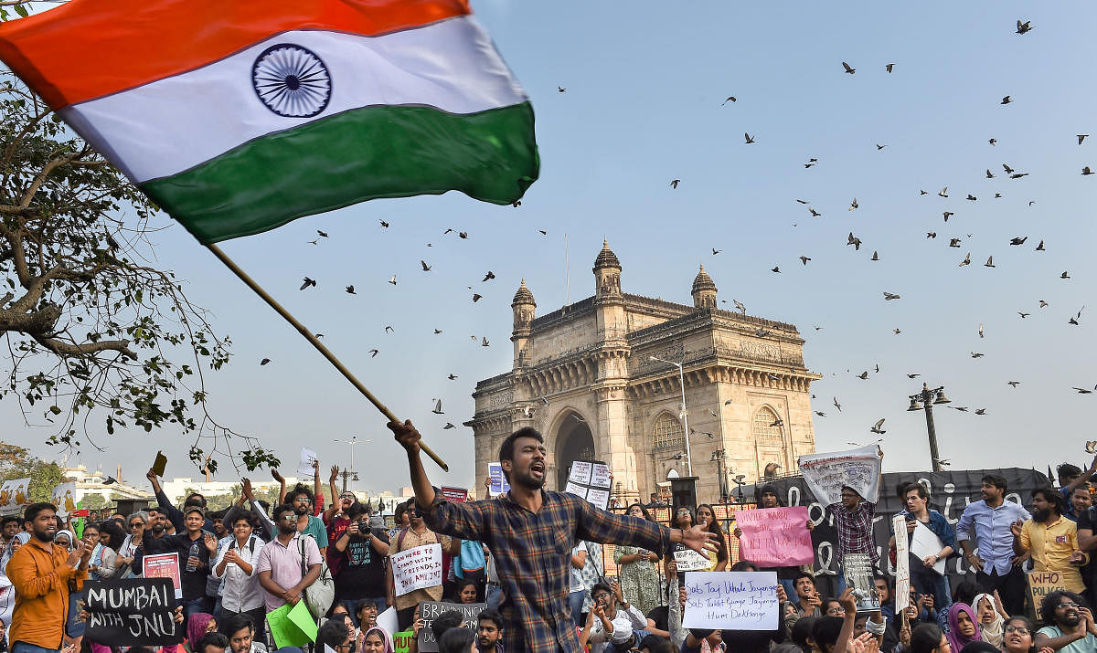 Students stage a protest near the Gateway of India to condemn the violence at Delhi's Jawaharlal Nehru University, in Mumbai, Monday, Jan. 6, 2020. Credit: PTI Photo