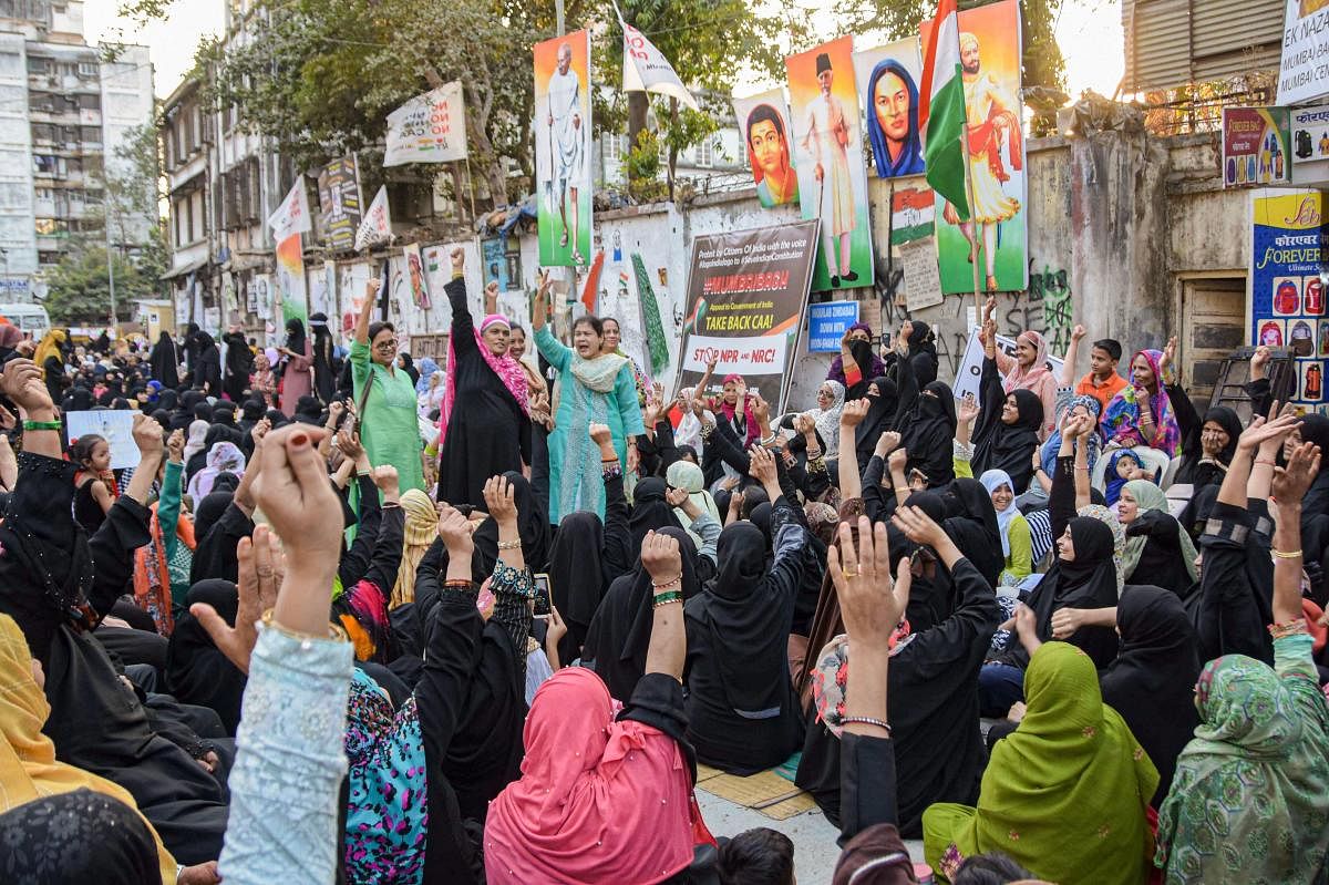 Muslim women raise slogans during an anti-Citizenship Amendment Act (CAA) protest, at Nagpada, in Mumbai, Wednesday, Feb. 5, 2020. (PTI Photo)