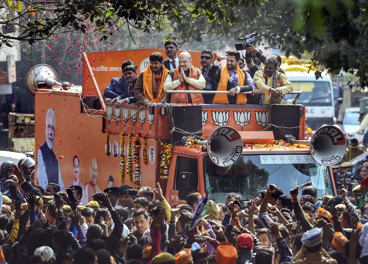 Union Home Minister and BJP leader Amit Shah during an election campaign rally ahead of the forthcoming Delhi Assembly elections, at Seemapuri constituency in New Delhi, Thursday, Feb. 6, 2020. (PTI Photo)