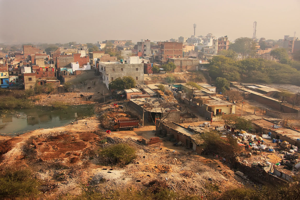 Slums of New Delhi seen from Tughlaqabad Fort, India. (Photo credit: Istock)