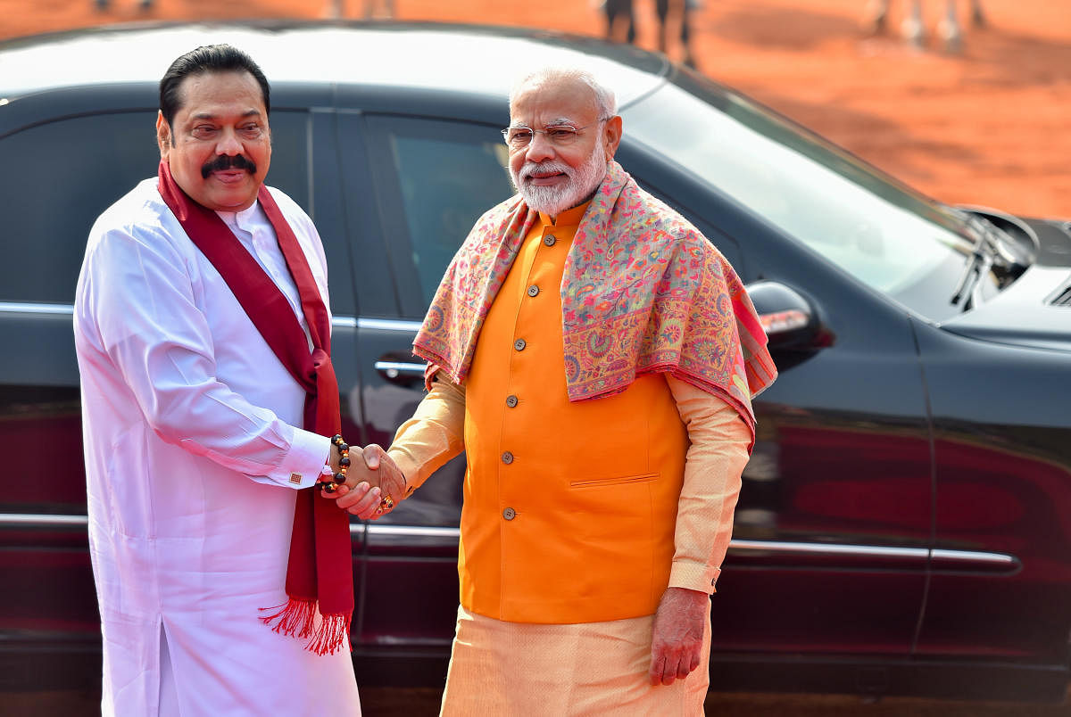 Prime Minister Narendra Modi welcomes Sri Lankan Prime Minister Mahinda Rajapaksa during a ceremonial reception at the Rashtrapati Bhavan in New Delhi, Saturday, Feb. 8, 2020. (PTI photo)