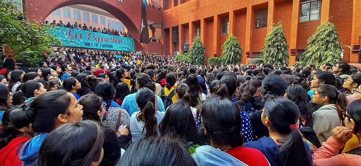 Students stage a protest against the alleged molestation of students by a group of men who had gatecrashed a cultural festival, at Gargi College, in New Delhi, Monday, Feb. 10, 2020. (PTI Photo)