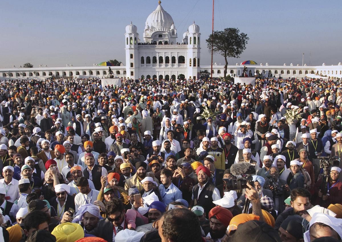  Sikh pilgrims visit the shrine of their spiritual leader Guru Nanak Dev, at Gurdwara Darbar Sahib in Kartarpur, Pakistan (AP Photo)