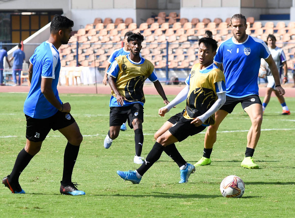 Bengaluru FC players sweat it out during a training session on the eve of their game against Paro FC in Bengaluru. DH Photo/ B H Shivakumar