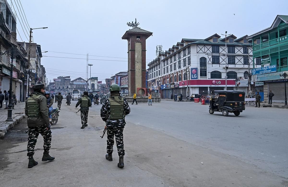 Security personnel patrol during a one-day strike called by Jammu and Kashmir Libration Front (JKLF) to mark the death anniversary of Jammu and Kashmir Liberation Front (JKLF) founder Maqbool Bhat in Srinagar on February 11, 2020. (AFP Photo)