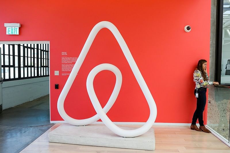 A woman talks on the phone at the Airbnb office headquarters in the SOMA district of San Francisco. (Reuters Photo)