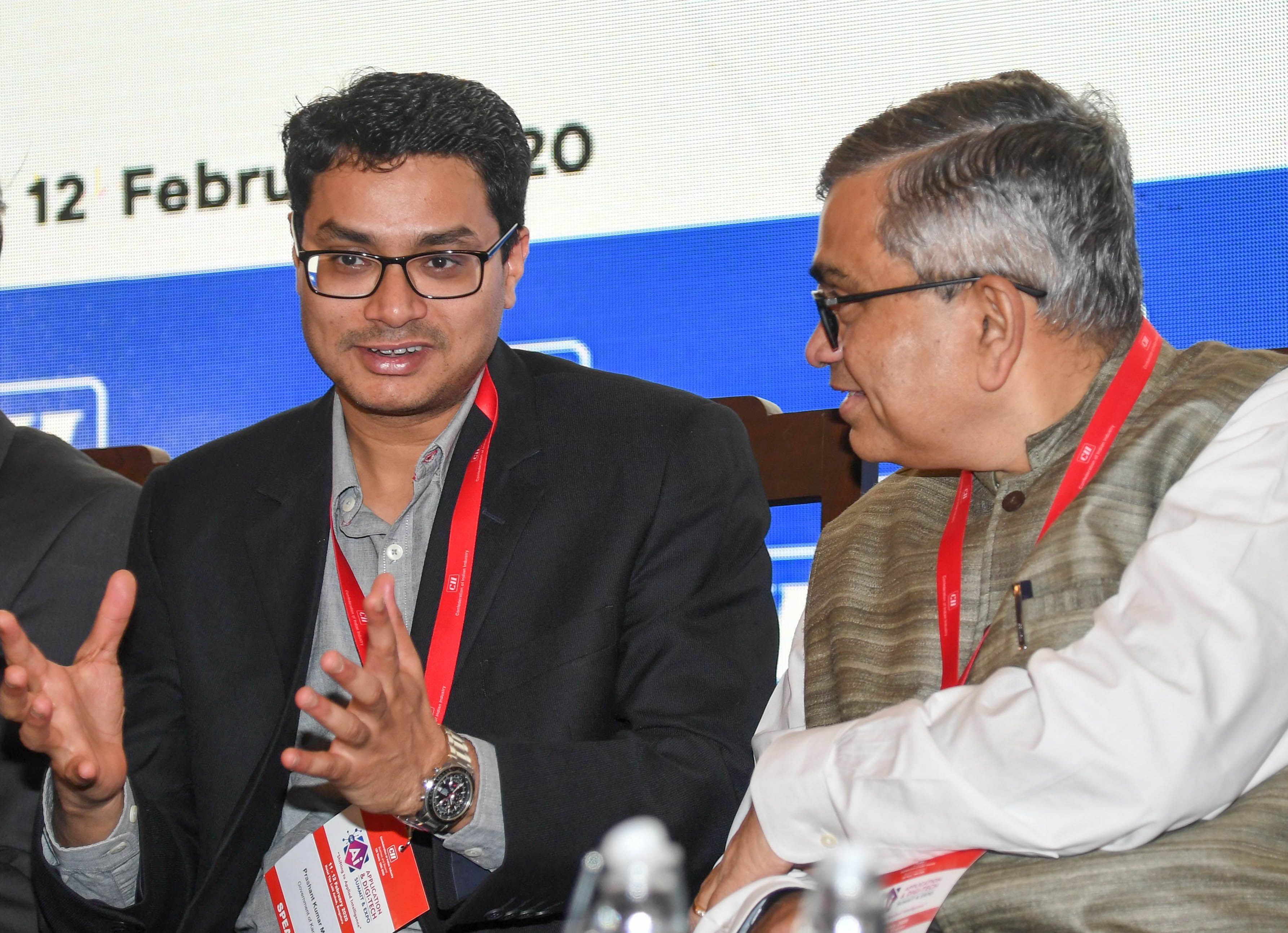 (From Left) Prashant Kumar Mishra, Director Department of IT &BT and MD, KITS GOK and Krishnakumar Natarajan, Co-Founder Mindtree are seen at the inaugural session of Ai Application & Digi-Tech Summit & Expo, organised by Confederation of Indian Iindustry (CII), at The Lalit Ashok, in Bengaluru. (DH Photo)