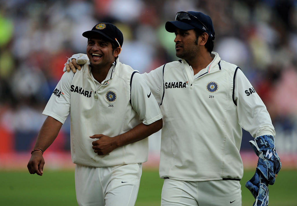 MS Dhoni of India has a laugh with team mate Suresh Raina (L) during day three of the 3rd npower Test at Edgbaston on August 12, 2011 in Birmingham, England. (Photo by Gareth Copley/Getty Images)