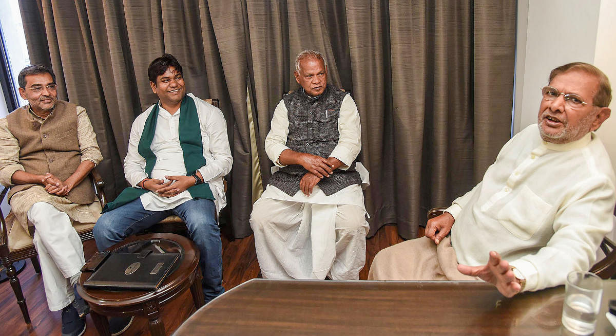Loktantrik Janata Dal (LJD) leader Sharad Yadav (R) with Rashtriya Lok Samata Party chief Upendra Kushwaha (L), HAM chief Jitan Ram Manjhi (2R) and Vikassheel Insan Party (VIP) founder Mukesh Sahni during a meeting (PTI Photo)