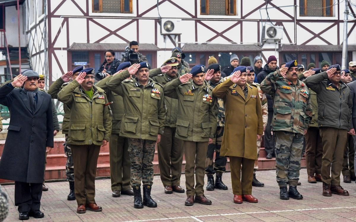 Senior officers of civil administration, Army, CRPF and Police pay tribute to Special Police Officer (SPO) Shahbaaz Ahmad, who was killed along with an army soldier during a gun battle with militants at Khrew of Pulwama District, during a wreath-laying ceremony in Srinagar, Wednesday, Jan. 22, 2020. (PTI File Photo)