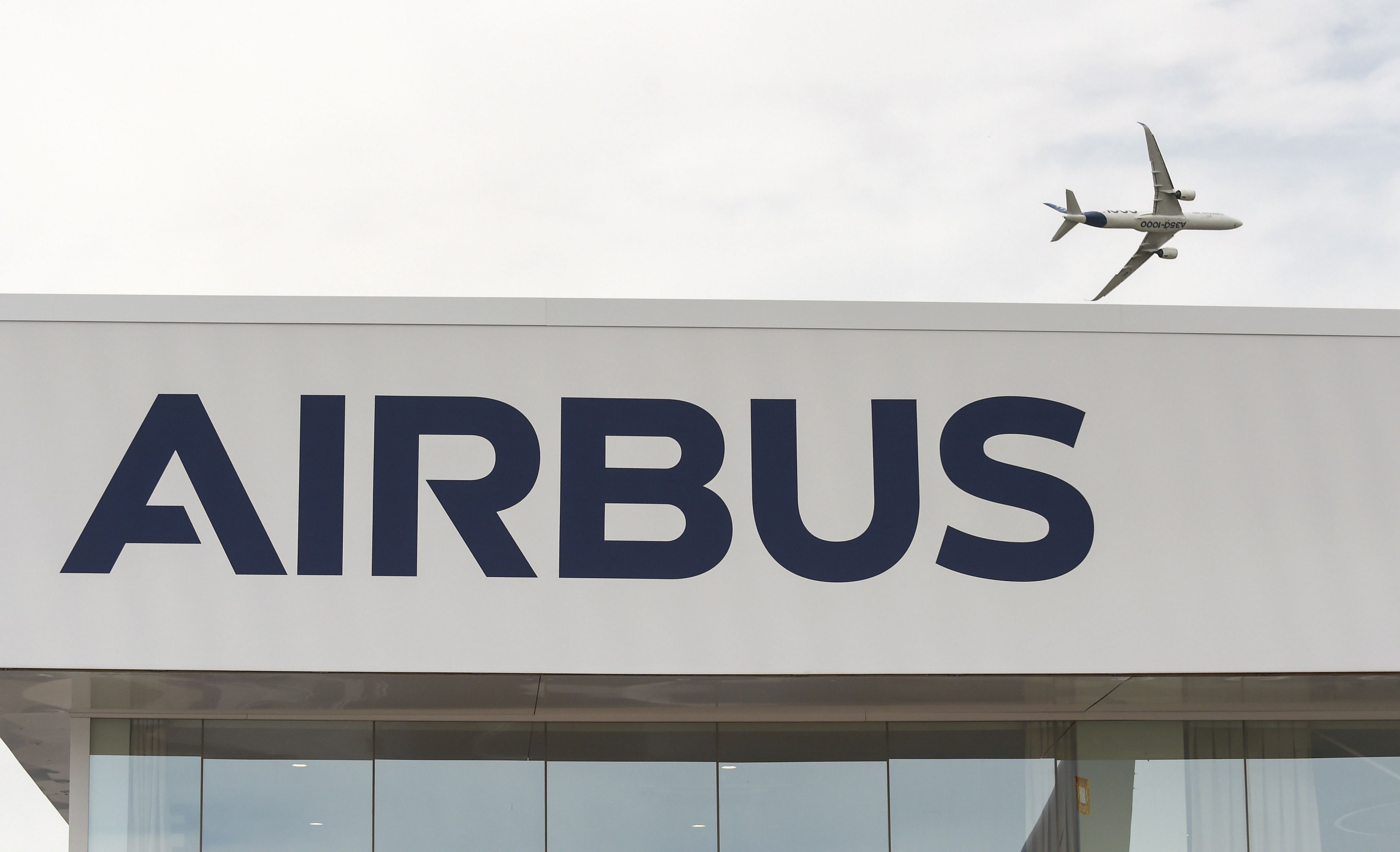  In this file photo taken on June 18, 2019 an Airbus A350 1000 performs its flying display at the International Paris Air Show at Le Bourget Airport, near Paris. (Credit: AFP Photo)