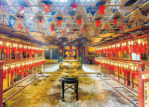 aromatic Incense coils hang from the ceiling of Man Mo Temple in Hong Kong.