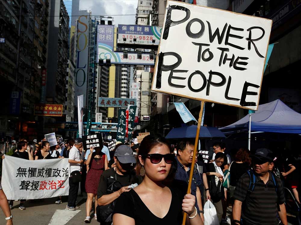 Pro-democracy activists take part in a protest on China's National Day in Hong Kong, China October 1, 2017. REUTERS/Bobby Yip