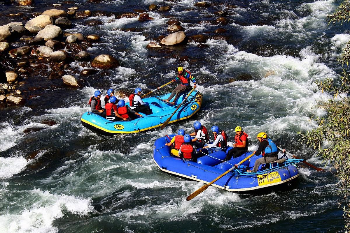 Tourists attempt river rafting on the Beas river in Manali, Himachal Pradesh. PTI file photo.