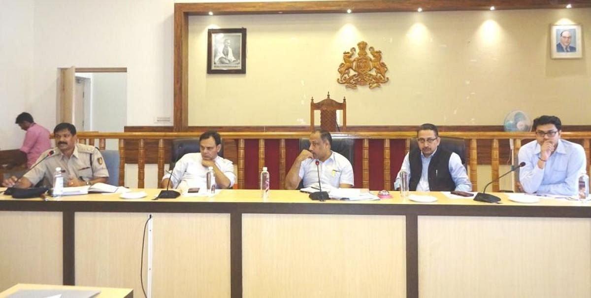 Tourism Department secretary Anil Kumar chairs a meeting in Madikeri on Friday.