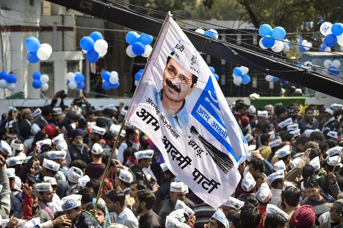  AAP supporters at party office following party's victory in the State Assembly election, in New Delhi, Tuesday, Feb. 11, 2020. (PTI Photo)