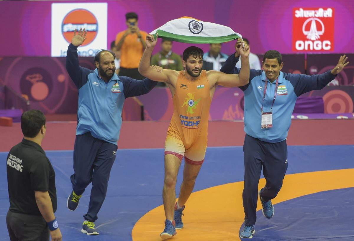 India's Sunil Kumar celebrates after his win against Salidinov Azat (KAZ) in the final of 87kg category wrestling match during the Asian Wrestling Championship 2020. PTI