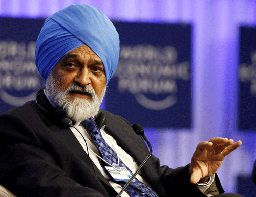 Rapid implementation of GST and reduction in fiscal deficit should be the thrust areas for the new government that will help the country achieve 7-7.5 per cent growth, Planning Commission Deputy Chairman Montek Singh Ahluwalia said today. Reuters File Photo