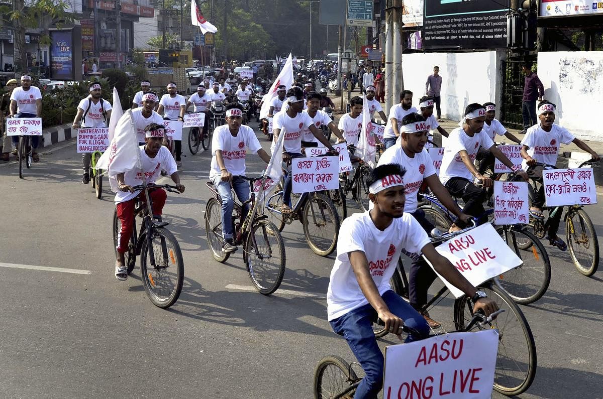 All Assam Students' Union (AASU) members take part in a cycle rally to protest against the Citizenship Amendment Bill. (PTI Photo)
