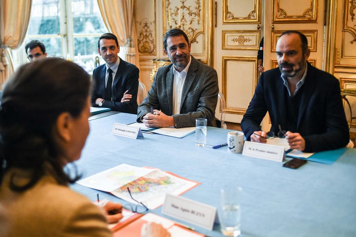 French Prime Minister Edouard Philippe (R), French Interior Minister Christophe Castaner (2R), Civil Security Advisor at the Ministry of the Interior Jerome Guerreau (2L), French Health and Solidarity Minister Agnes Buzyn and other ministers attend a meeting regarding measures to be taken after the first cases of coronavirus infection in France and the situation of French expatriates in the area of the epidemic in China. AFP