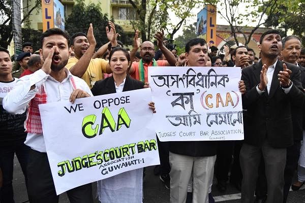 Demonstrators take part in 'Satyagraha' to protest against the Citizenship Amendment Act (CAA) in Guwahati on December 16, 2019. (AFP photo)
