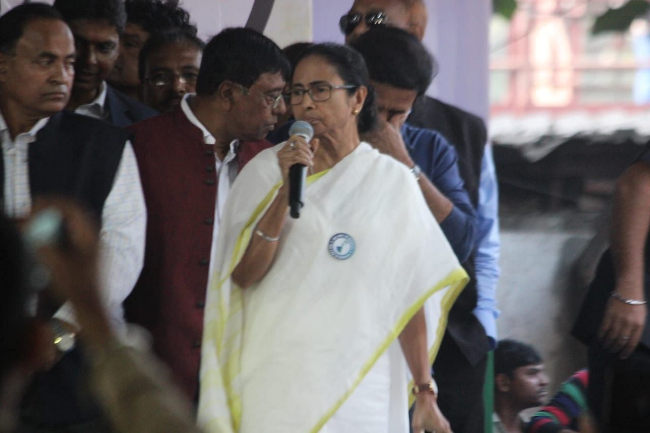 TMC supremo Banerjee, along with her party colleagues, began a protest march from Howrah Maidan which will culminate at Dorina Crossing at Esplanade in the heart of Kolkata. Photo/Twitter (@AITCofficial)