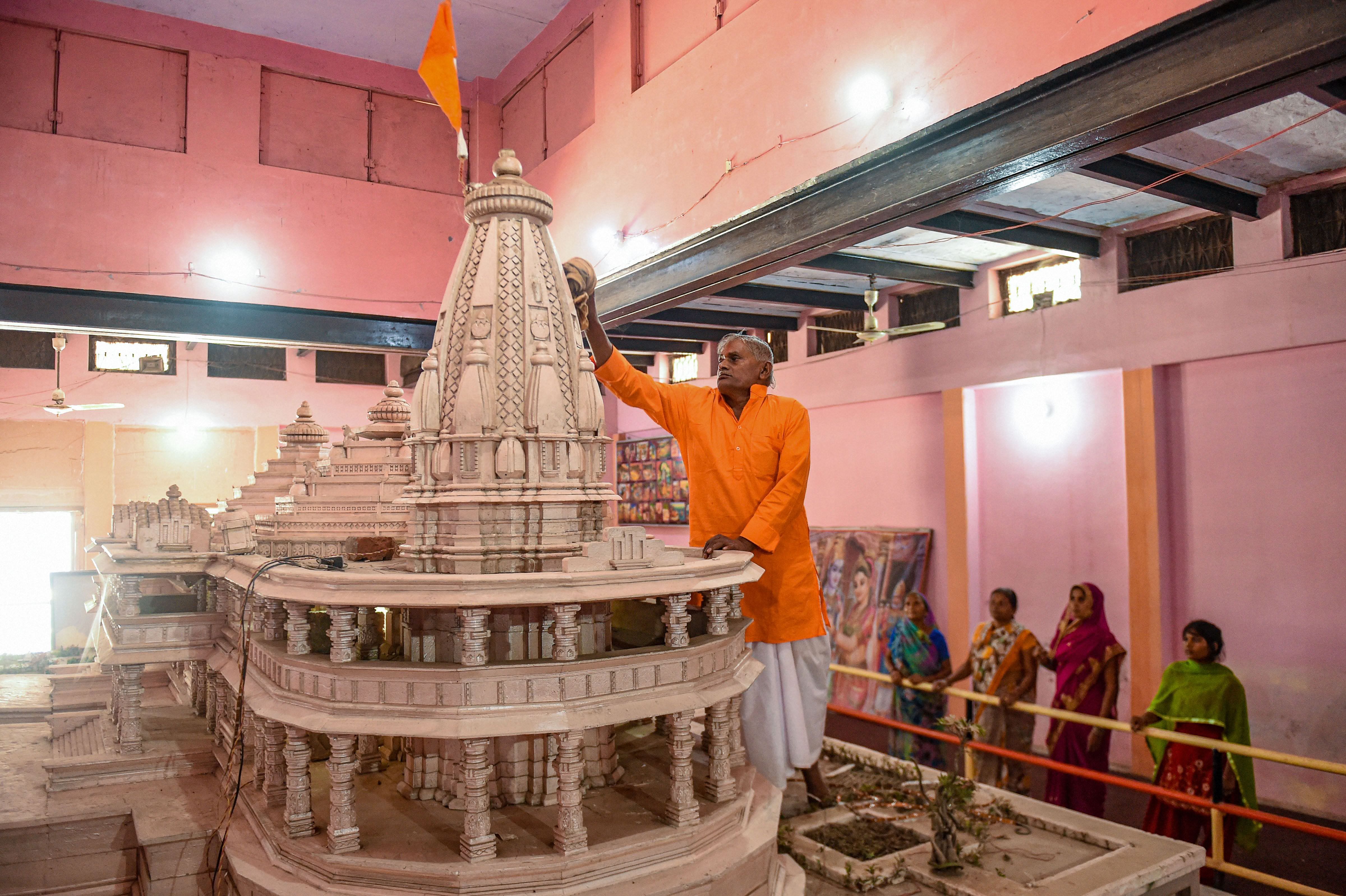 Replica of the proposed Ram Mandir on display at Karsewakpuram, in Ayodhya, Monday, Nov. 11, 2019. (Credit: PTI Photo)