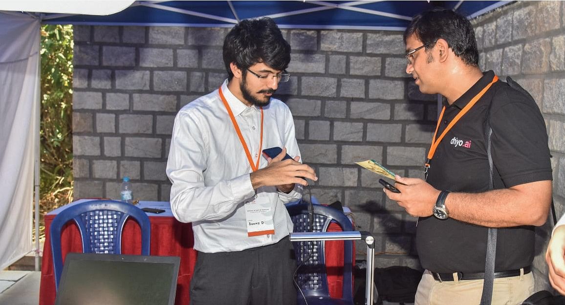 Visitors looking new tool designed to help blind people to read the textat Social Startup Santhe as the part of Social Ventures Incubation programme organised by NSRCEL at IIM Bengaluru. (Credit: DH Photo/S K Dinesh)