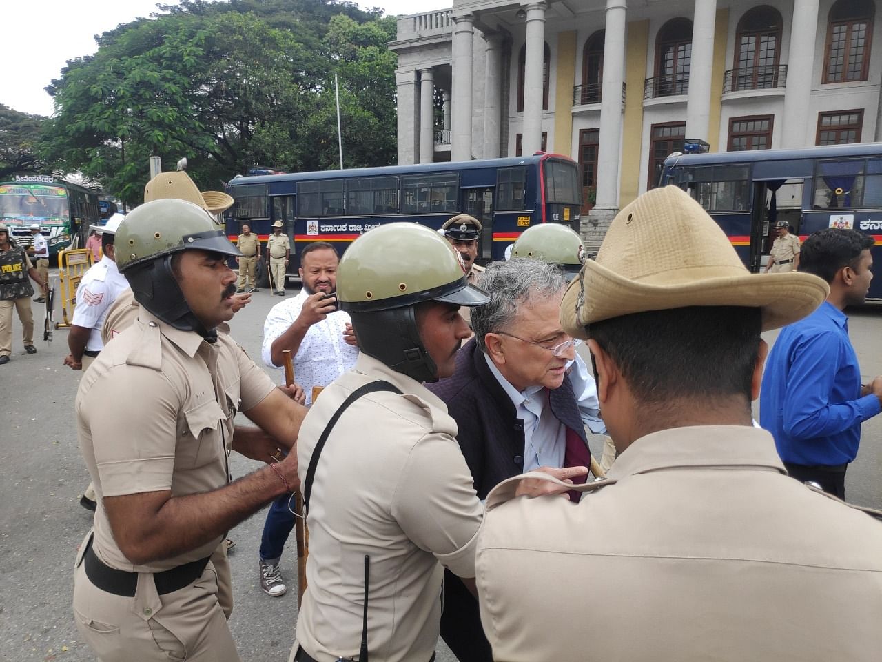 Ramachandra Guha being arrested by the Bengaluru Police.