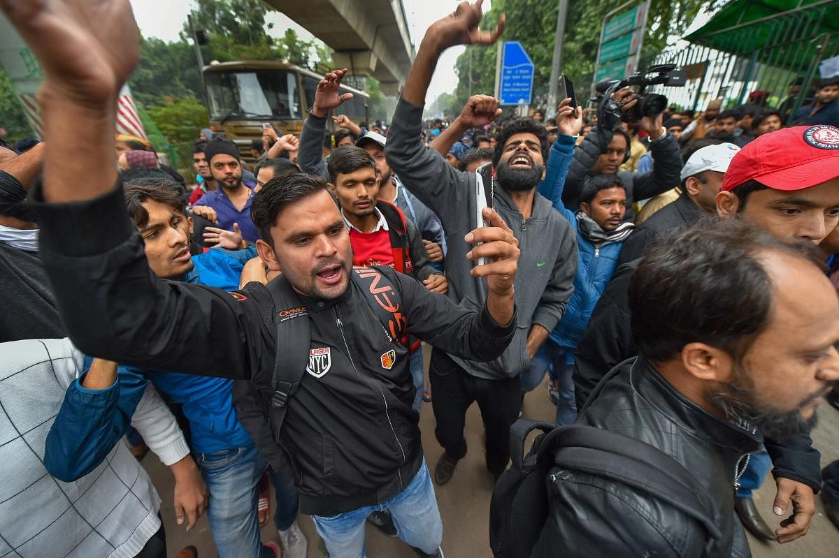 At the Delhi University, students alleged that police cracked down on peacefully protesting students who boycotted exams. Photo/PTI