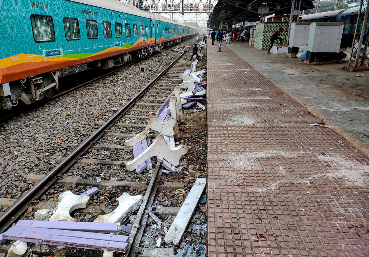 Uluberia: Vandalised railway station property lies on the tracks after it was ransacked by protestors agitating against NRC and CAB issue at Uluberia Station in Howrah district of West Bengal, Friday, Dec. 13, 2019. (PTI Photo)