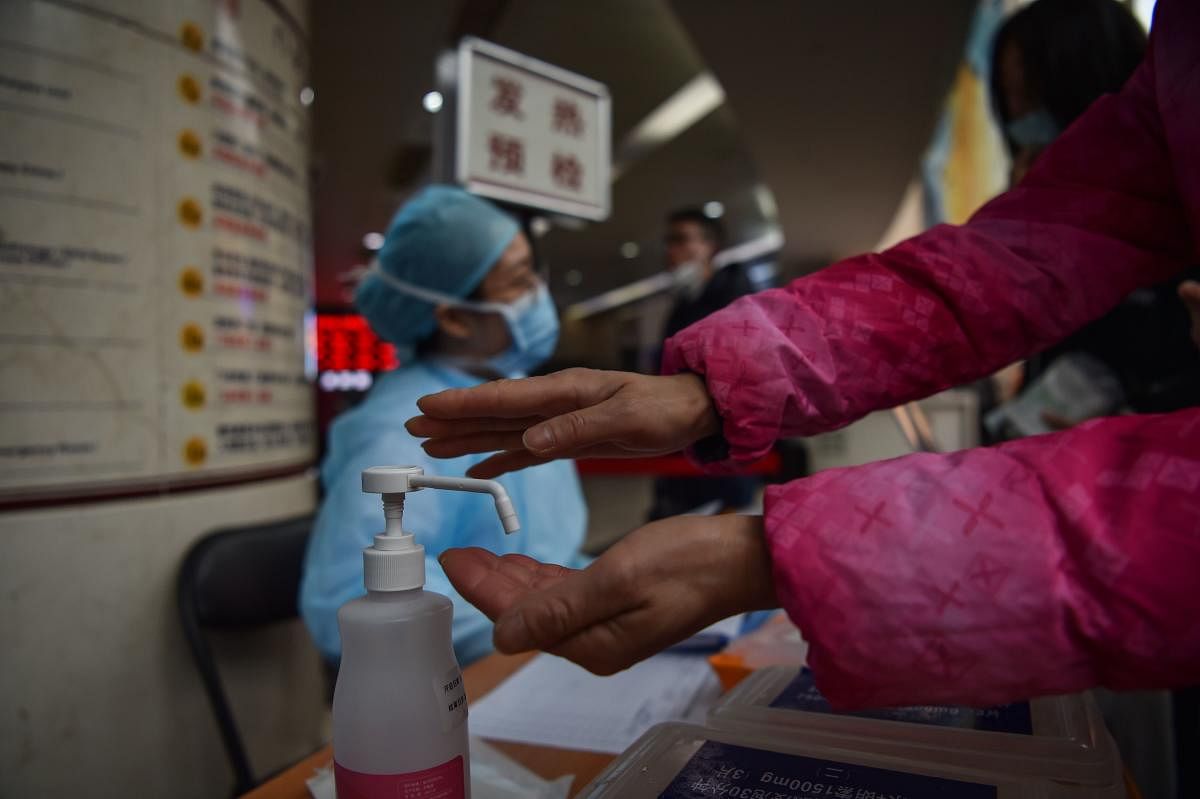 The virus, originating in the central Chinese city of Wuhan in Hubei at the end of last year, has spread to Chinese cities including Beijing, Shanghai and Macao, as well as the United States, Thailand, South Korea, Japan and Taiwan. (Photo by AFP)