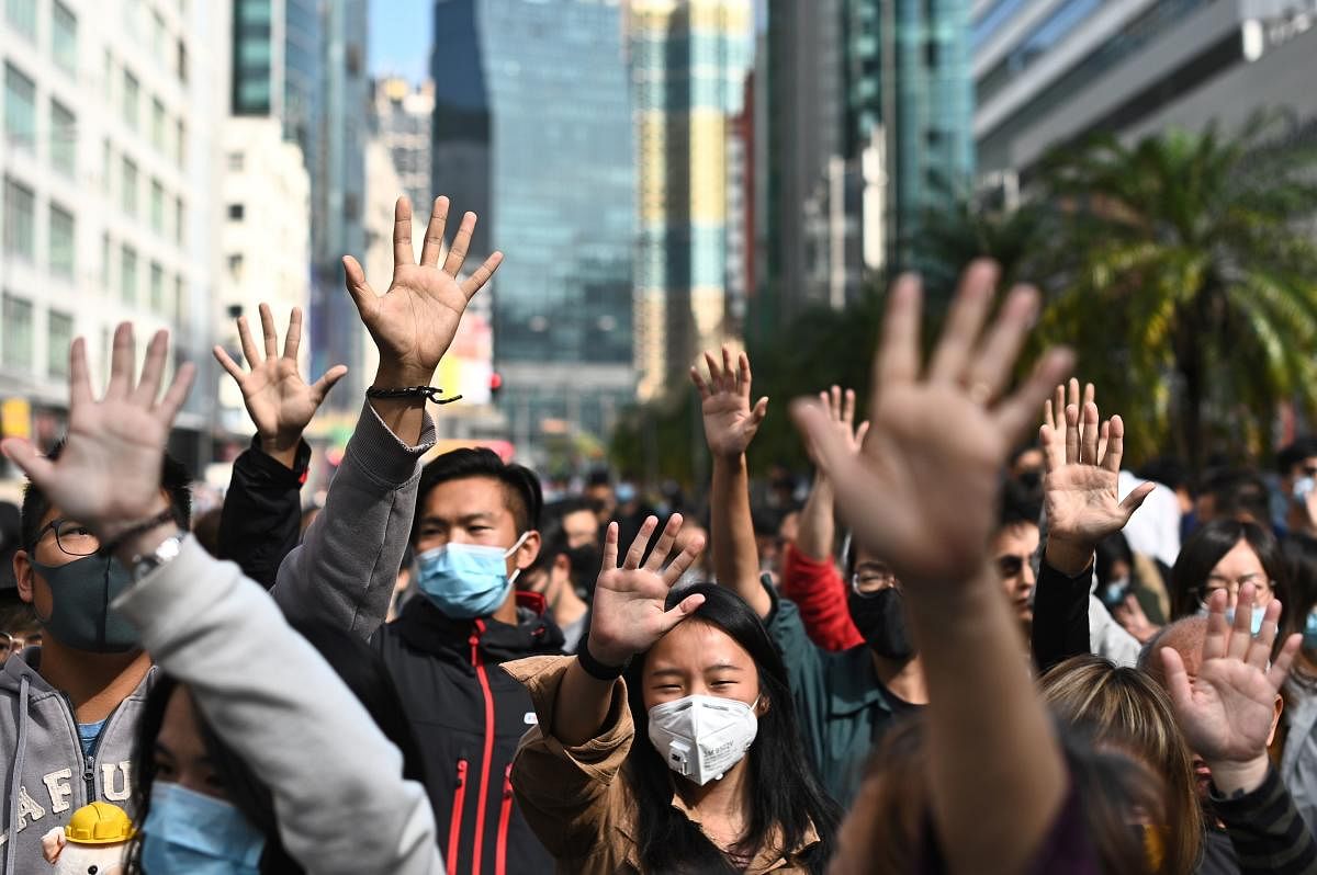 Secondary-school students and retirees joined forces at a protest in Hong Kong. (AFP Photo)