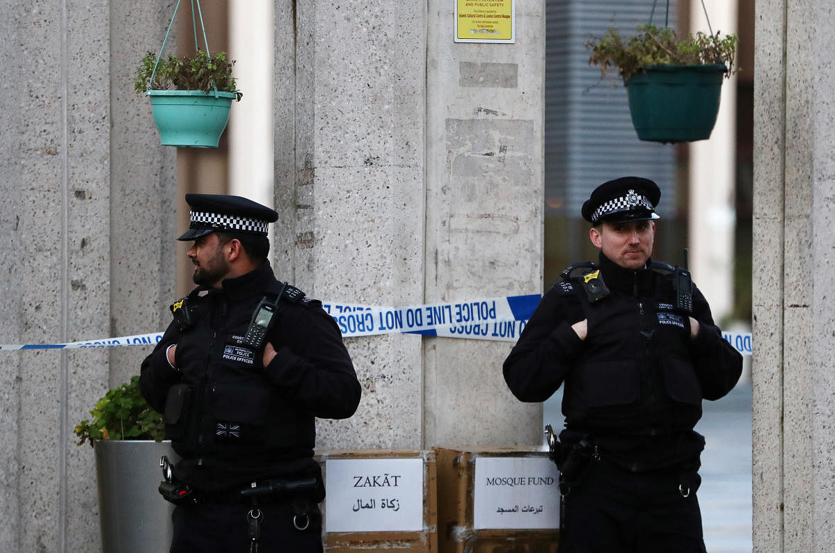 Police officers are seen outside the London Central Mosque in London. Reuters
