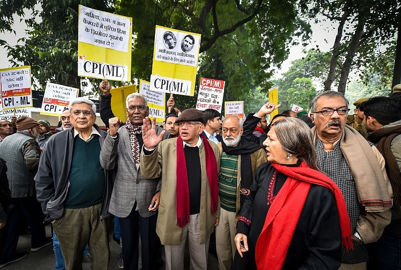 Left leaders D Raja, Sitaram Yechury, Nilotpal Basu, Brinda Karat, Prakash Karat and others raise slogans during an anti-Citizenship Act protest, at Mandi House, in New Delhi. (PTI Photo)