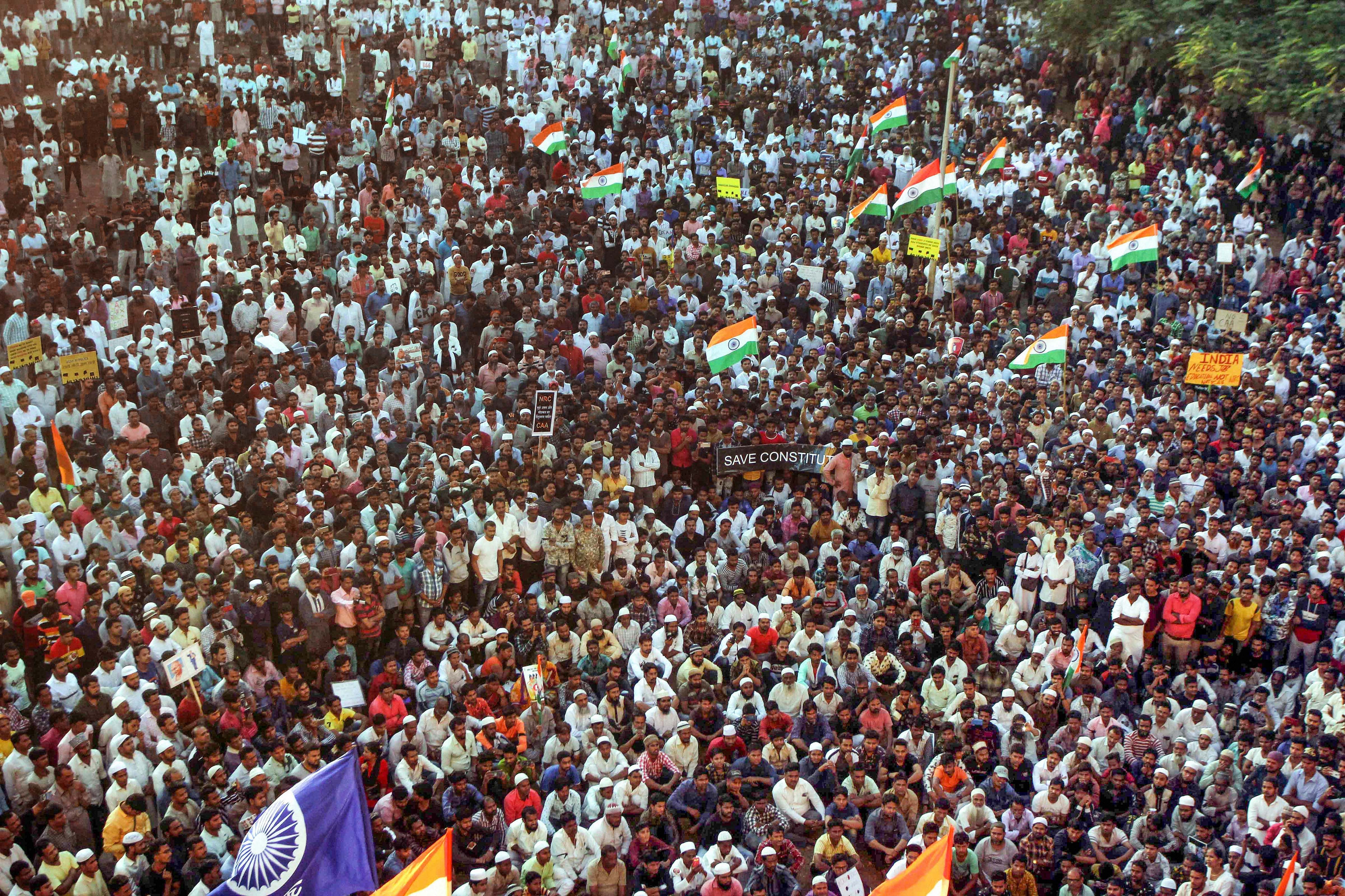 Muslim community people participate in the protest rally against the Citizen Amendment Act. (PTI Photo)