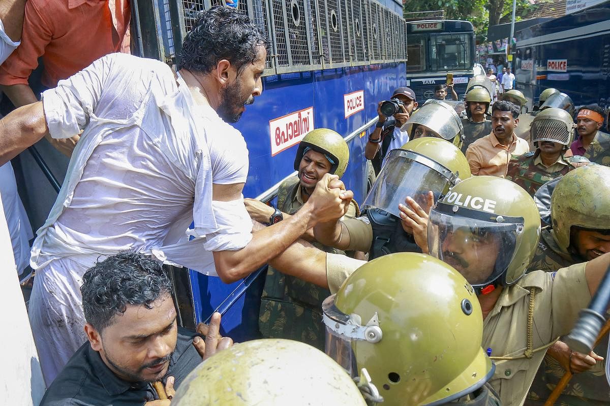  Police arrest protesters during a rally against CAA and NRC in Kozhikode. (PTI Photo)