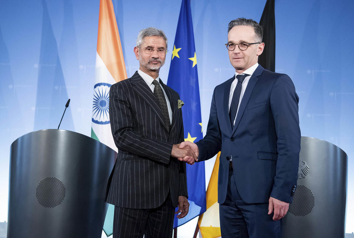 German Foreign Minister Heiko Maas shakes hands with his Indian counterpart and Subrahmanyam Jaishankar, Foreign Minister of India at the end of a press conference following their meeting at the Federal Foreign Office in Berlin. AP/PTI