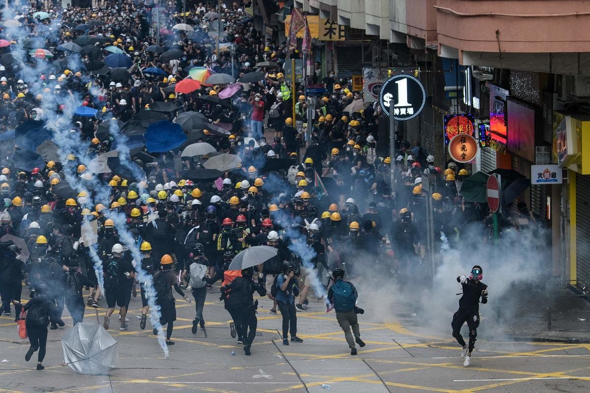Tear gas is fired by police at protesters in Sham Shui Po in Hong Kong. (AFP file photo)
