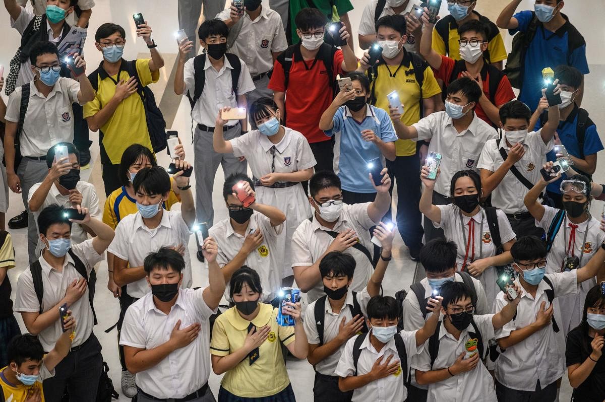 Anti-government protesters have thrown petrol bombs at police and central government offices, stormed the Legislative Council, blocked roads to the airport, trashed metro stations and lit fires on the streets. AFP Photo